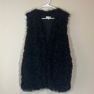 Love on a Hanger women’s black vest . Size L